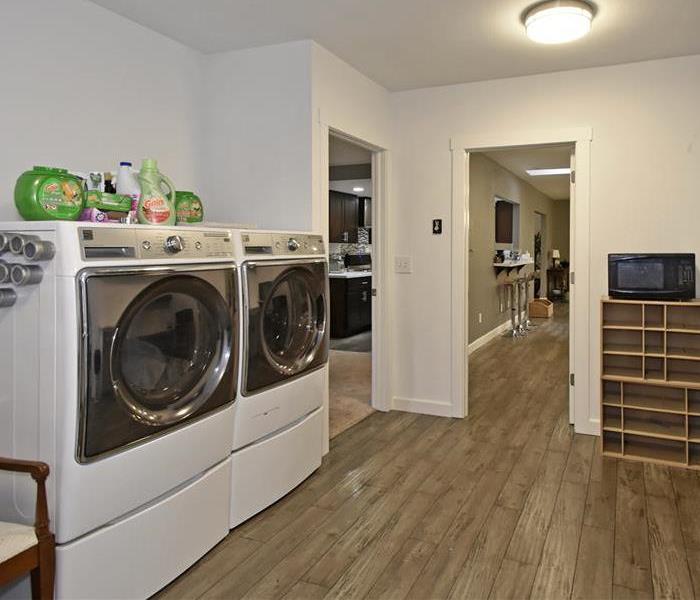 Laundry room after everything is put back together for the new renter to enjoy.