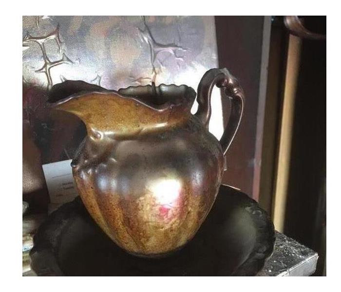 Soot damaged pitcher and bowl